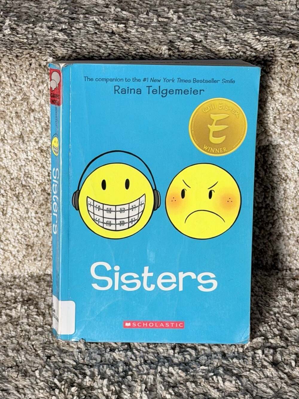 Sisters by Raina Telgemeier Graphic Novel